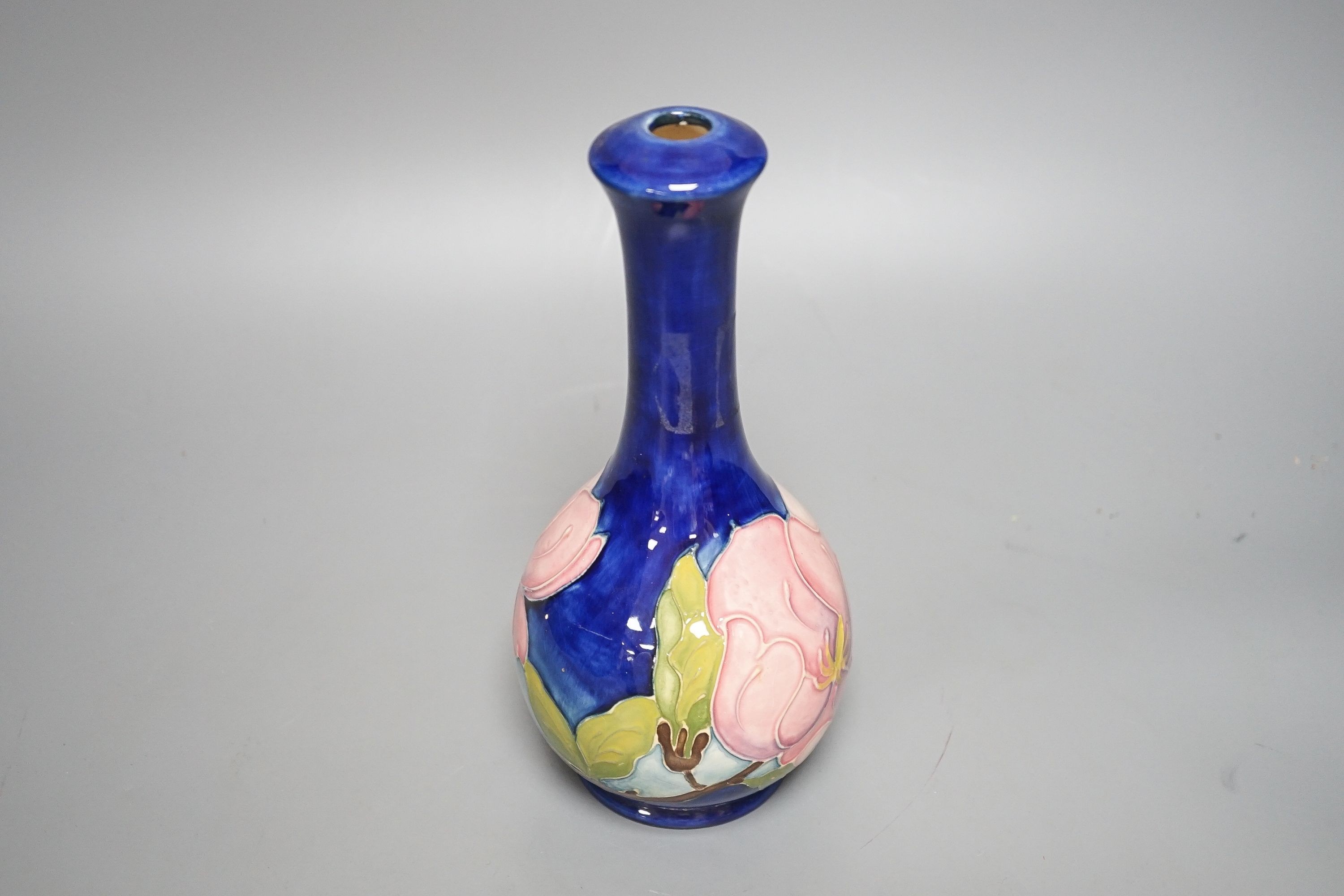 A Moorcroft magnolia pattern bottle vase 22.5cm